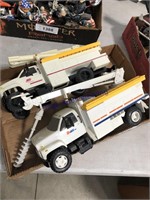 Pair of toy utility trucks