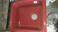 Red porcelain sink