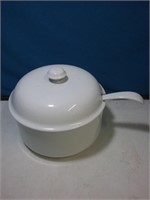 White pottery soup tureen with matching ladle