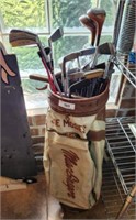 JOE MOSES VINTAGE GOLF BAG AND ASSORTED CLUBS