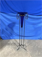 Blue colored glass vase with tall metal stand, 50