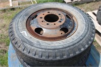 Pair of 8.25 x 20 steer tires and rims