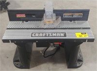 Craftsman router table with a Skil router