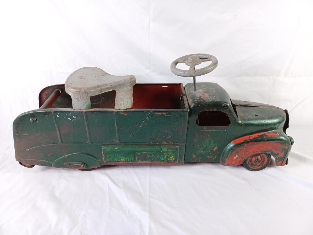 Vintage V.F.D. child sit and ride metal firetruck