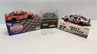 (3) Die cast collectible nascar cars: 1:24 scale