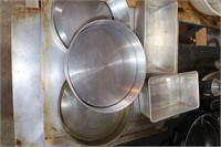 lot of aluminum pans, cake plates, cookie sheets