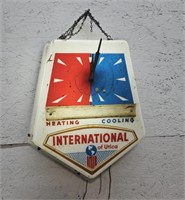 International of Utica light up clock