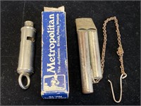 Pair of unusual vintage whistles.