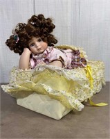 Porcelain Doll with Lace Bassinet Basket