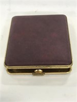 Burgundy gold trimmed vanity blush container