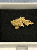 Gold nugget, .7 grams,  a little larger than a ric