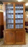 English Wavy Glass Door Walnut Bookcase.