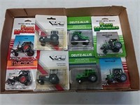 assortment of 1/64 scale tractors