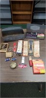 Vintage metal tackle box and assorted fishing
