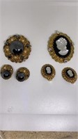 2 brooch/earrings sets, gold tone shiny, cameo