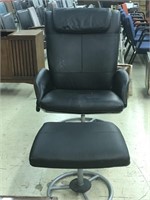 black recliner with footstool
