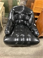 Sleek Black Leather Swivel Chair.