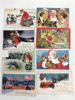 A lot of eight Santa Claus postcards.