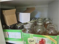 all canning jars in left cubby lids
