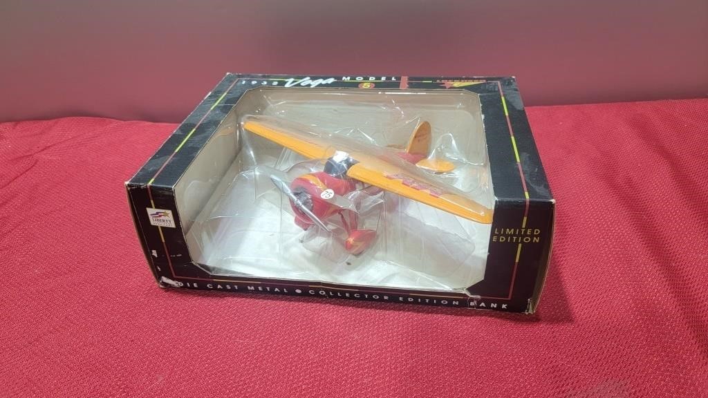 Nib diecast Minneapolis Moline plane bank