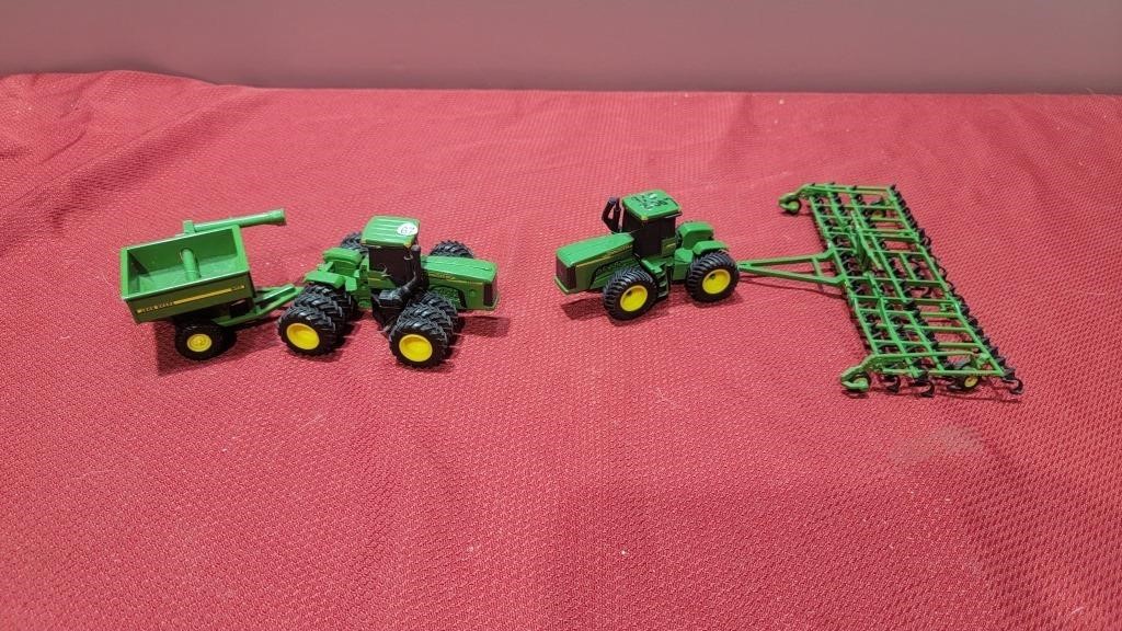 2 diecast john deere tractors and emplacements