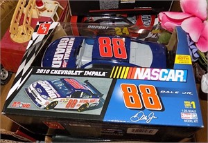 SEVERAL RACE CARS, NEW IN THE BOX