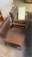 2 wooden chairs with leather seats