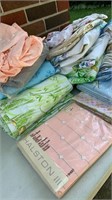 Assorted vintage linens - mostly twin sheets,