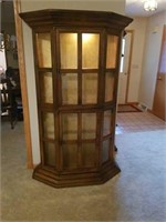Oak angle front lighted curio cabinet