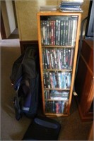 Storage Rack of DVD's and 2 PS3 Games