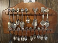 Vintage spoon collection with wood display