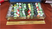 Glass box  with shooter marbles