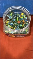 Planters peanut plastic tub with cats eye marbles