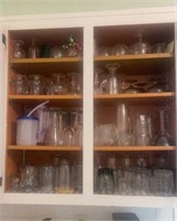 Cabinet full of drinking glasses, dessert bowls