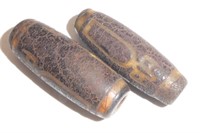 PAIR TIBETAN ARCHAIC DZI BEADS