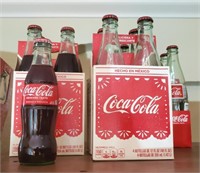 Grouping of coke bottles and carriers