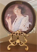 Coca cola tip tray and brass easel