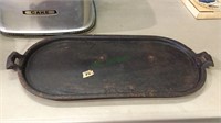 Cast-iron oval griddle with handles measuring
