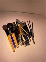 lot of makeup brushes, some high end