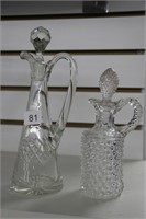 TWO GLASS VINEGAR/OIL BOTTLES WITH STOPPERS