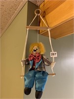 CLOWN ON THE SWING