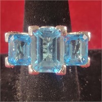 .925 Ring with light blue stones, sz 9,  0.5ozTW
