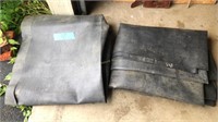Two pieces of rubber sheeting