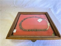 Wood Beaded Necklace in a Glass Shadowbox
