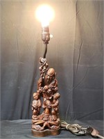 Asian handcrafted wood figural lamp,