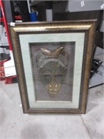 Framed mask artwork