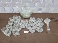 Vintage punch bowl with extra glasses
