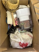 box of baskets, linens, shower curtain, water