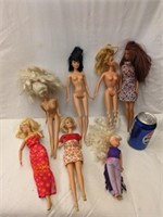 7 Barbie Dolls
