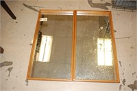(2) Oak Framed mirrors 33" x 17'